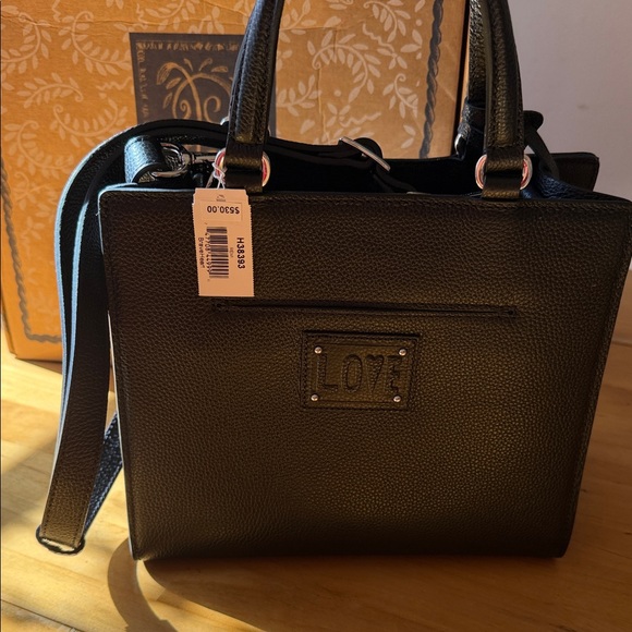 Black Quilted Handbag with Heart Accents - Picture 3 of 5